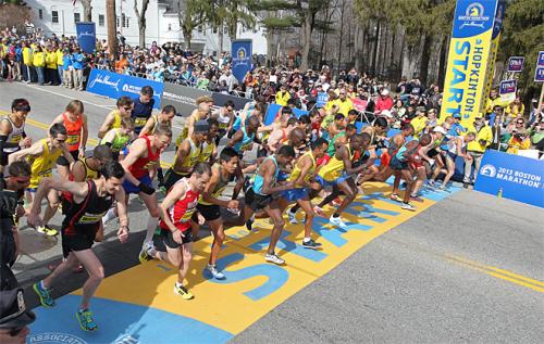 The elite men start the 117th running of the Boston Marathon, in Hopkinton, Mass., Monday, April 15, 2013